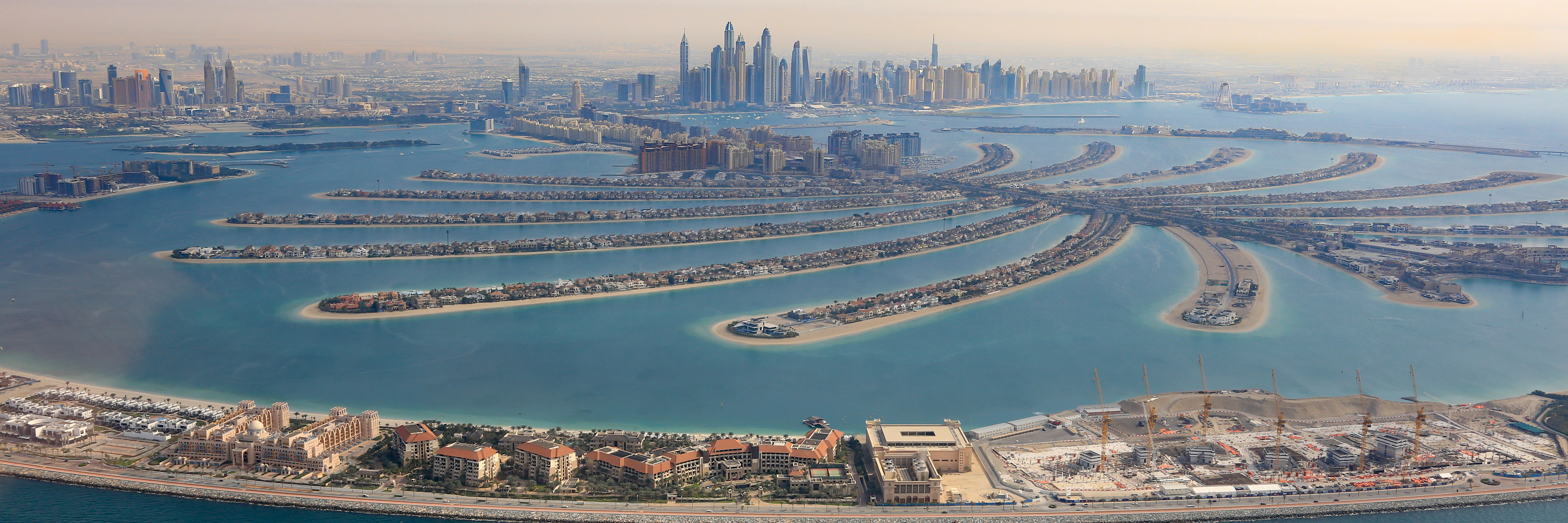 Jumeirah Beach Residence and the Dubai Marina skyline across the water