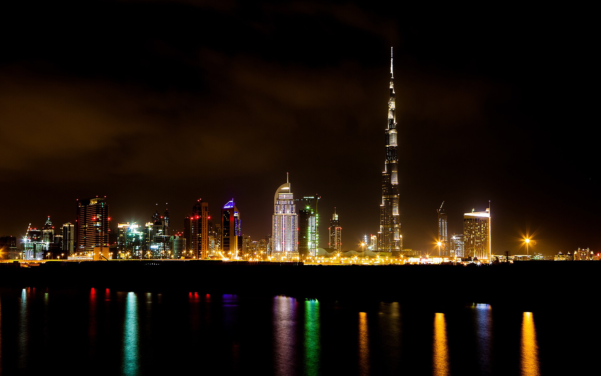 Dubai financial district towers illuminated at night