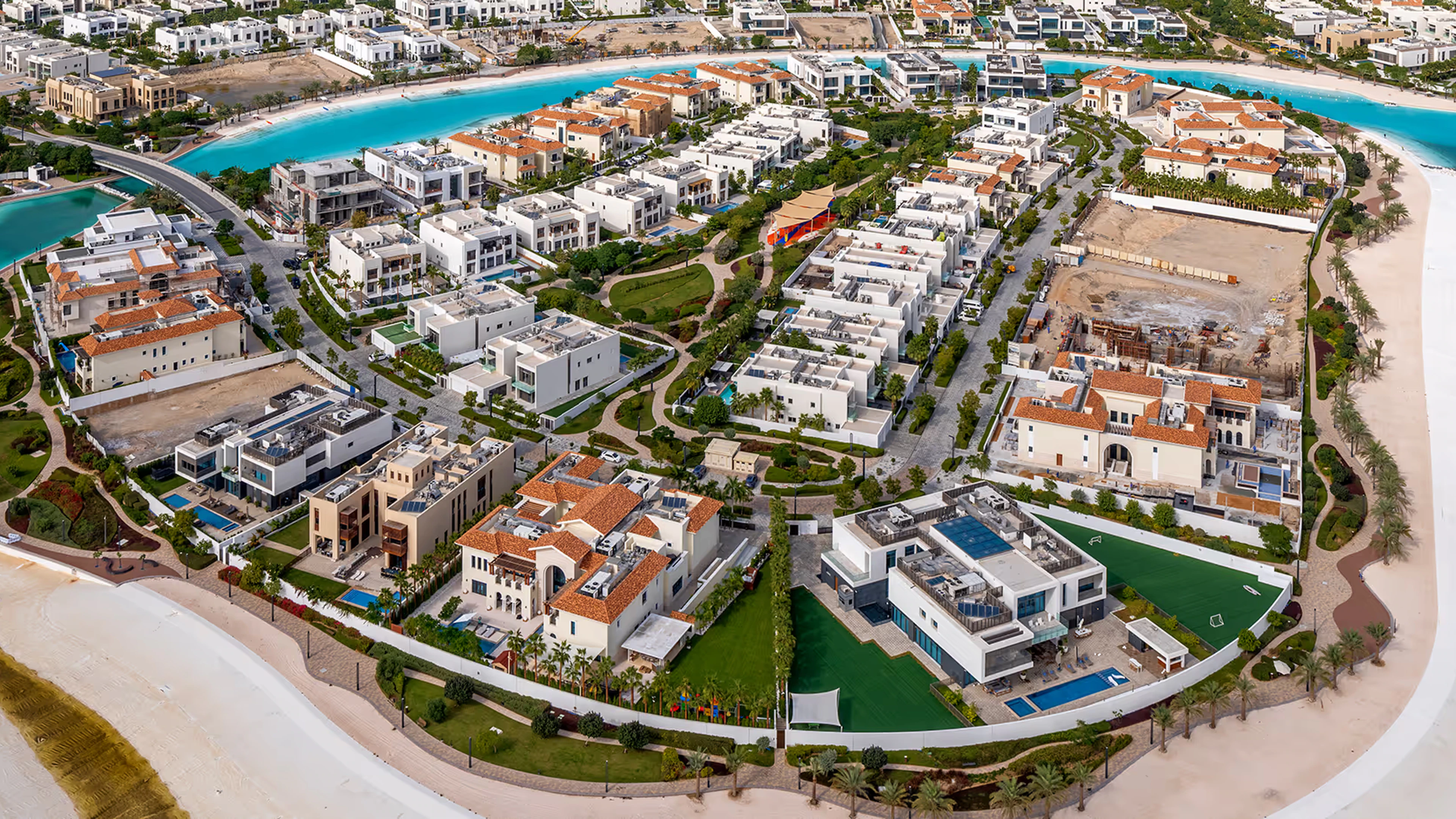 Official District One project media showing lagoon and residential masterplan context